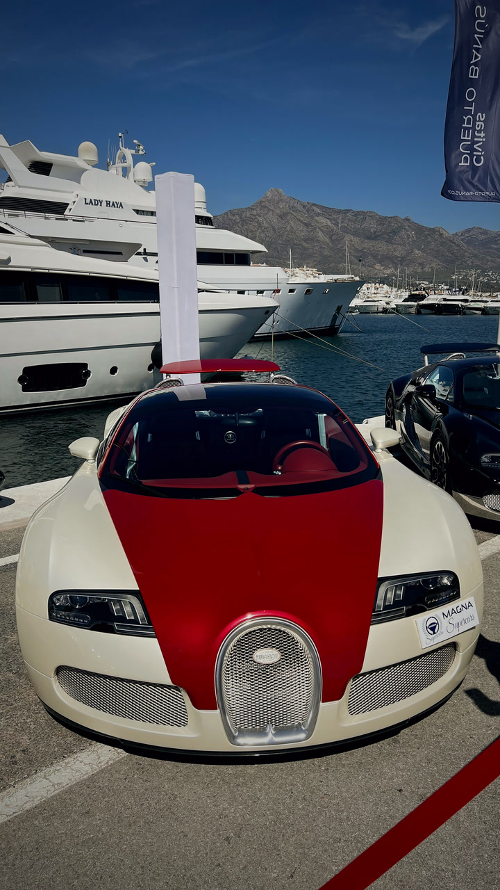 Red and cream Veyron with the yachts